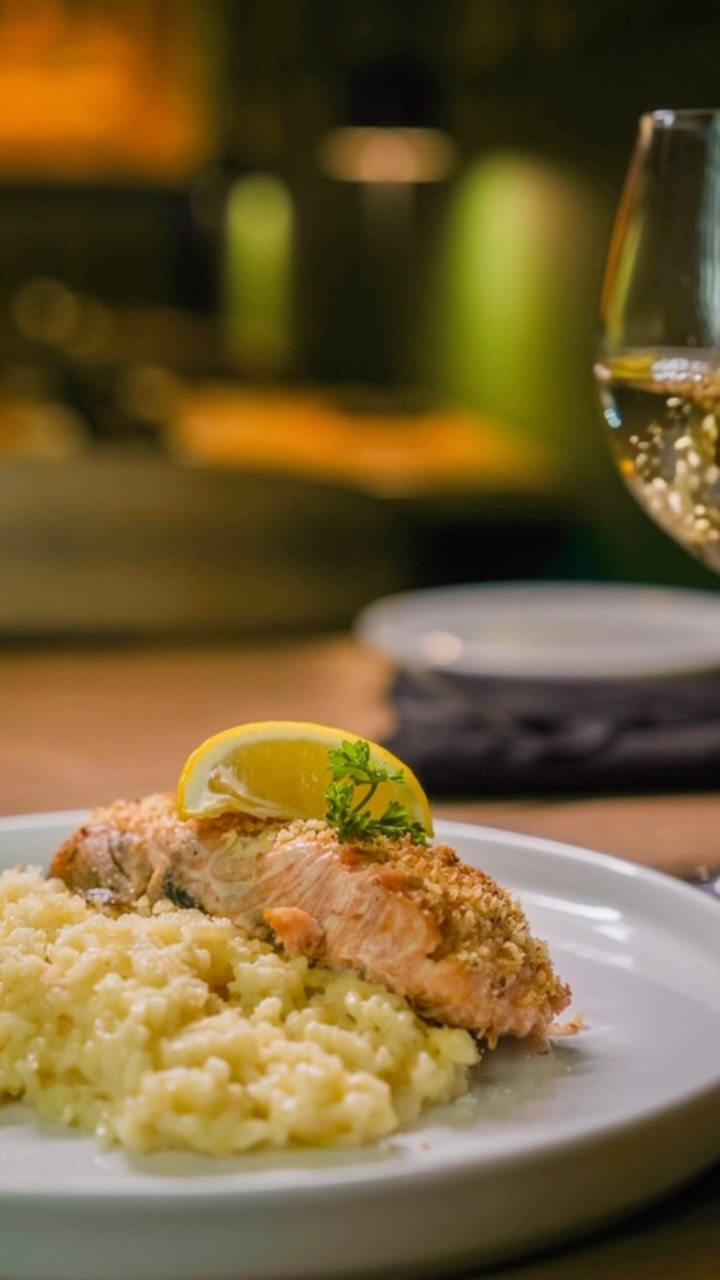 Salmone al Parmigiano con risotto de queso